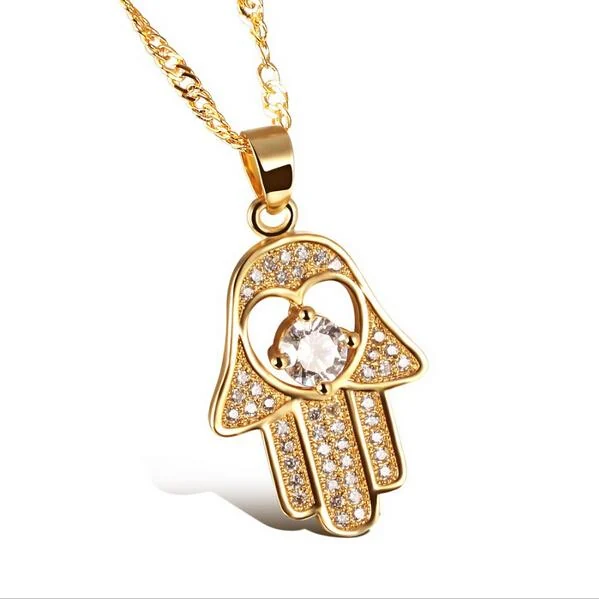 Dije mano hamsa en oro
